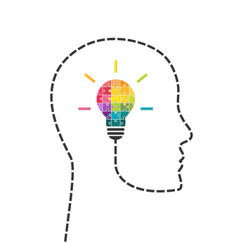 Creativity and innovation concept. Human head line with light bulb made of puzzle.